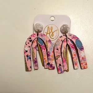 Audra styles earrings